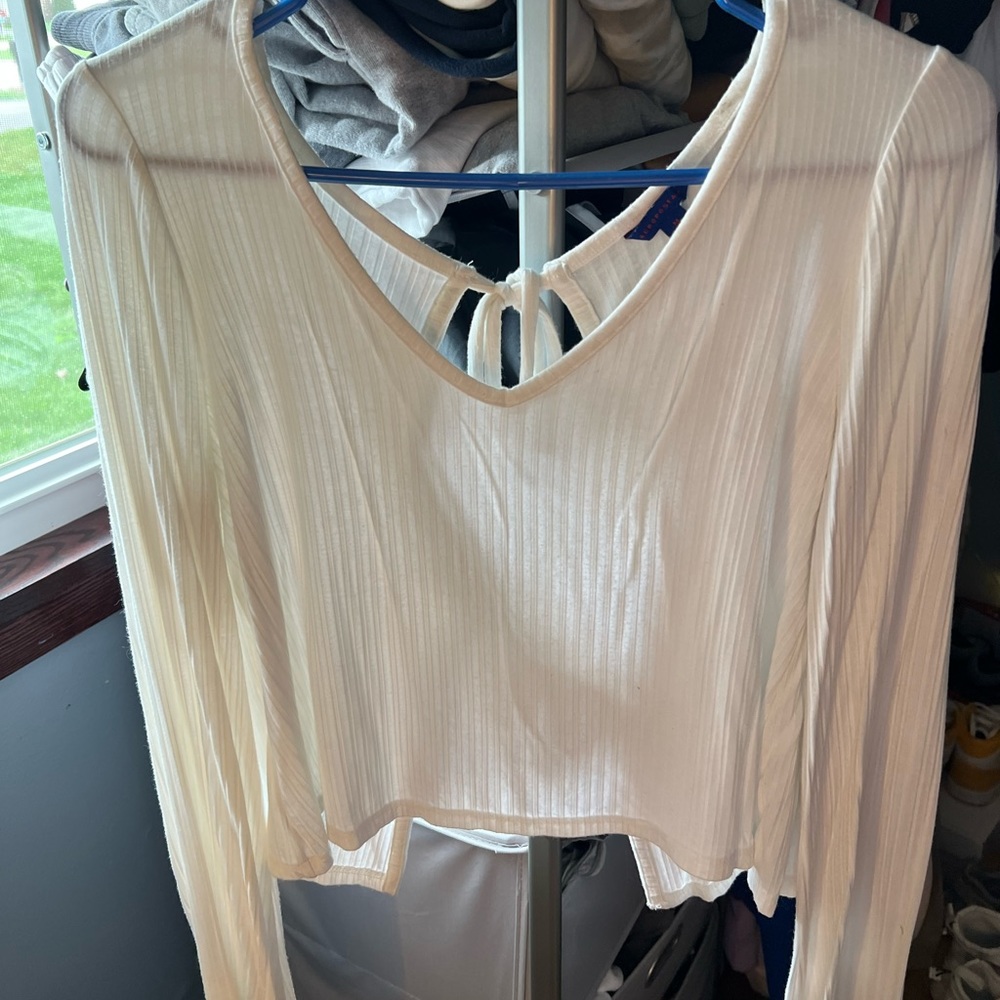 White long belle long sleeve with cut out back